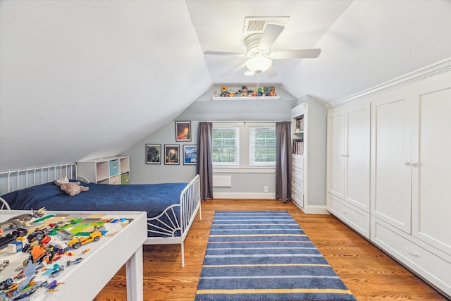 308 W 33rd St, Houston, TX 77018 - bedroom featuring vaulted ceiling, light wood-style floors, and ceiling fan
