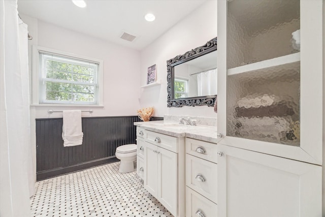 308 W 33rd St, Houston, TX 77018 - bathroom with a wainscoted wall, vanity, tile patterned floors, recessed lighting, and a shower with curtain