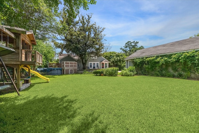 308 W 33rd St, Houston, TX 77018 - view of yard with a playground