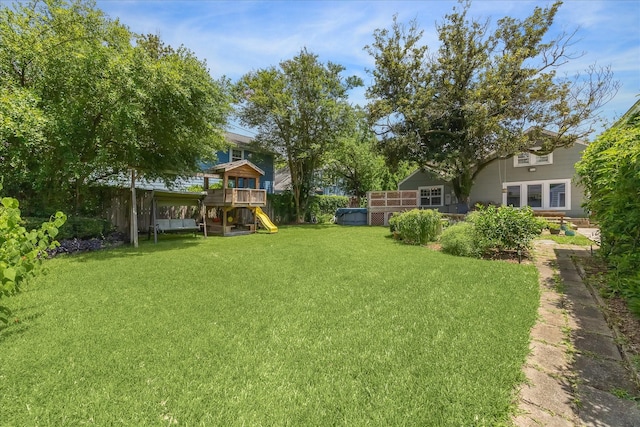 308 W 33rd St, Houston, TX 77018 - view of green lawn featuring a playground