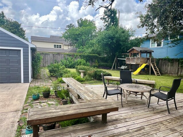 308 W 33rd St, Houston, TX 77018 - wooden terrace with a playground, a fenced backyard, and outdoor dining area