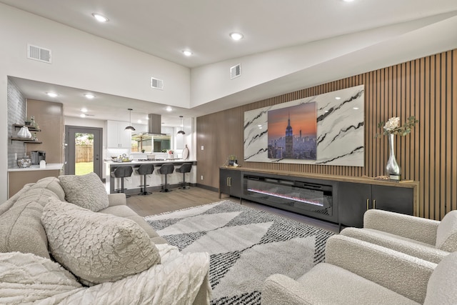 5425 Viking Dr, Houston, TX 77092 - living area featuring wood finished floors and recessed lighting