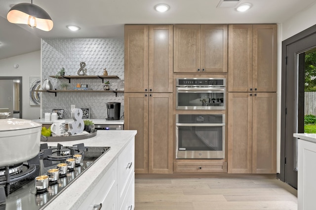 5425 Viking Dr, Houston, TX 77092 - kitchen featuring black stovetop, light wood finished floors, open shelves, recessed lighting, and light stone counters