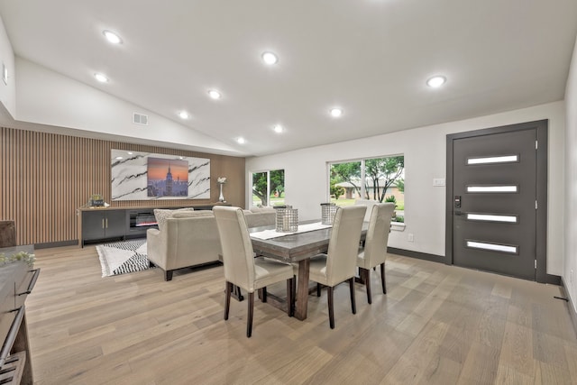 5425 Viking Dr, Houston, TX 77092 - dining area with recessed lighting, light wood-type flooring, and vaulted ceiling