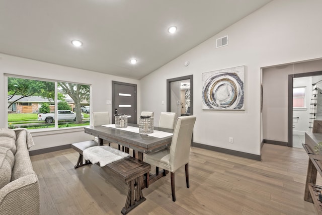 5425 Viking Dr, Houston, TX 77092 - dining space with vaulted ceiling, light wood-type flooring, and recessed lighting