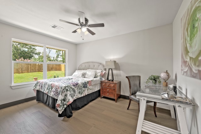 5425 Viking Dr, Houston, TX 77092 - bedroom featuring wood finished floors and a ceiling fan