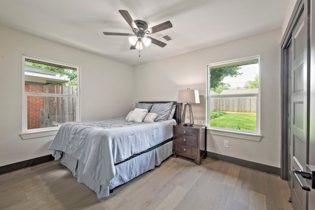 5425 Viking Dr, Houston, TX 77092 - bedroom with light wood-style floors and a ceiling fan