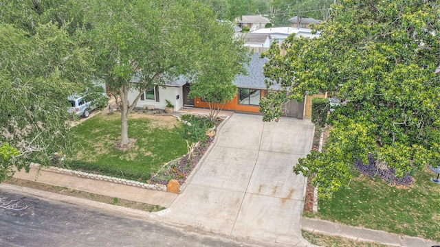 5425 Viking Dr, Houston, TX 77092 - view of front facade featuring driveway, a front lawn, and roof with shingles