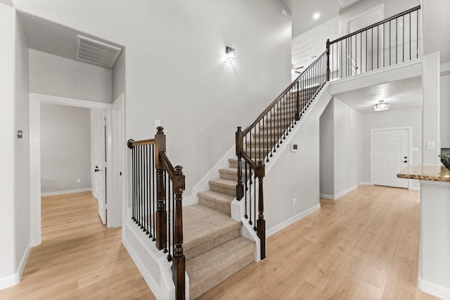 30742 Gardenia Trace Dr, Spring, TX 77386 - staircase with wood finished floors and a high ceiling