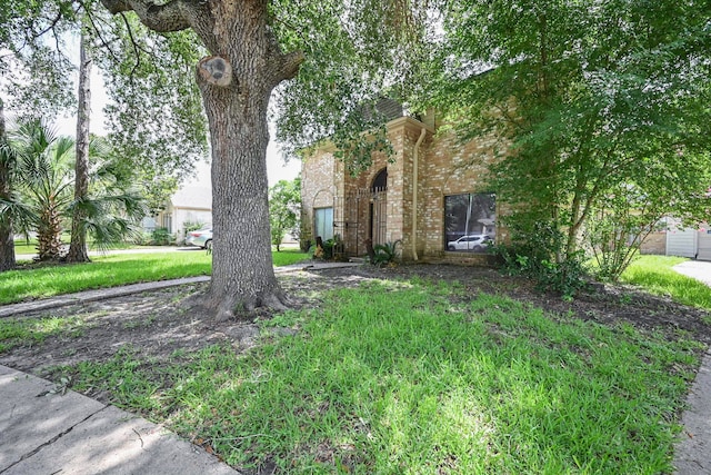 11811 Braesridge Dr, Houston, TX 77071 - view of property hidden behind natural elements with brick siding