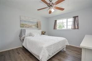 11811 Braesridge Dr, Houston, TX 77071 - bedroom featuring wood finished floors and a ceiling fan