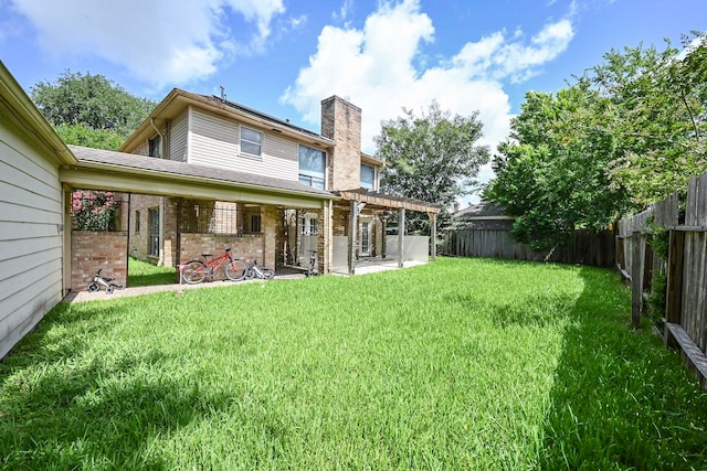 11811 Braesridge Dr, Houston, TX 77071 - rear view of house featuring a chimney, a pergola, brick siding, a fenced backyard, and a patio area