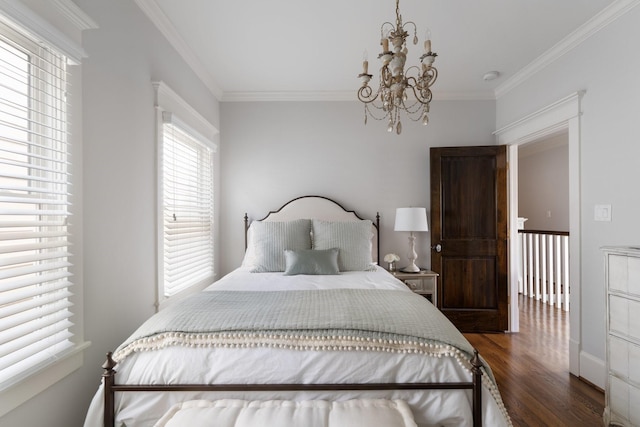 339 W 23rd St Unit A, Houston, TX 77008 - bedroom with a chandelier, wood finished floors, and crown molding