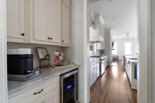 339 W 23rd St Unit A, Houston, TX 77008 - kitchen featuring beverage cooler, high end stainless steel range, dark wood-type flooring, backsplash, and recessed lighting