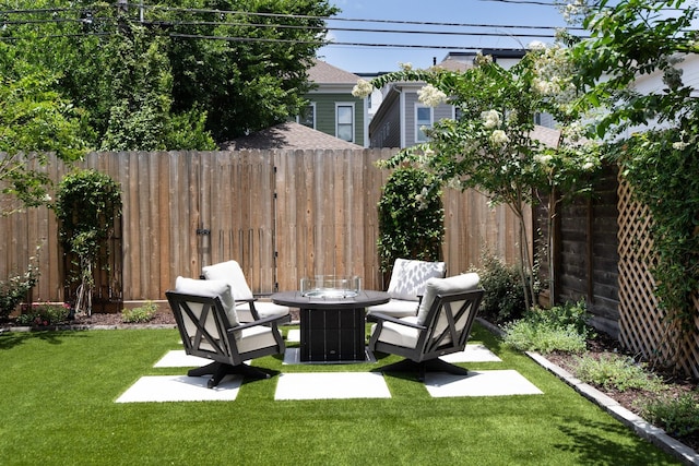 339 W 23rd St Unit A, Houston, TX 77008 - fenced backyard with an outdoor fire pit