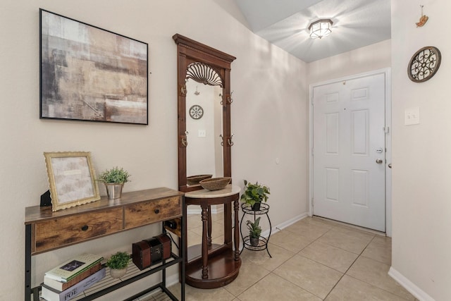 15006 Zenith Glen Ln, Cypress, TX 77429 - foyer entrance with baseboards and light tile patterned flooring