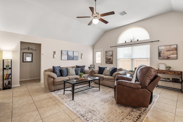 15006 Zenith Glen Ln, Cypress, TX 77429 - living area featuring light tile patterned floors, ceiling fan, and high vaulted ceiling