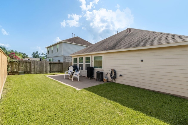 15006 Zenith Glen Ln, Cypress, TX 77429 - back of property with a patio, roof with shingles, and a fenced backyard