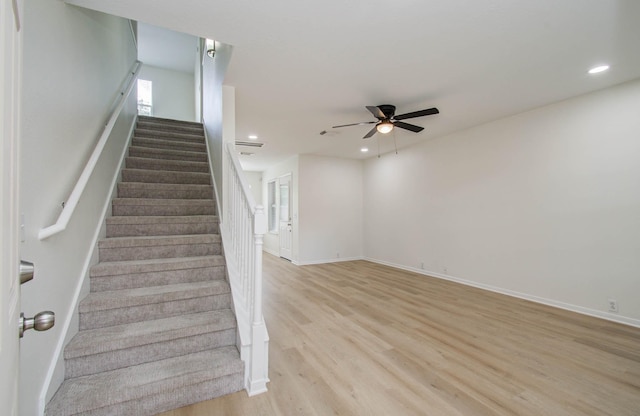 17515 Prospect Meadows Dr, Houston, TX 77095 - staircase with ceiling fan, wood finished floors, and recessed lighting