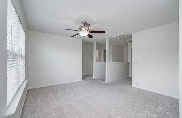 17515 Prospect Meadows Dr, Houston, TX 77095 - carpeted spare room featuring attic access and a ceiling fan