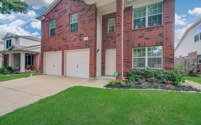 17515 Prospect Meadows Dr, Houston, TX 77095 - traditional home with brick siding, a front lawn, concrete driveway, and an attached garage