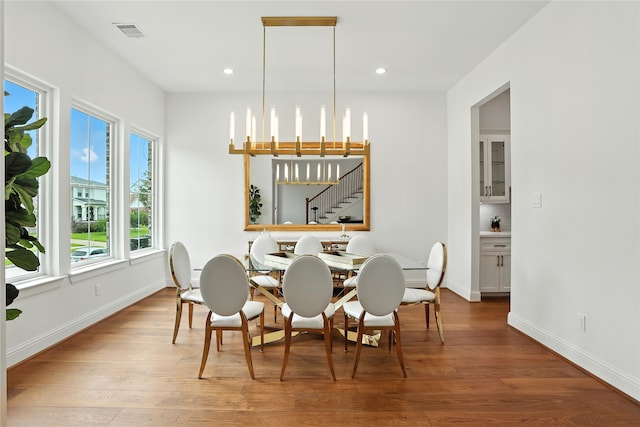 4951 Glenmeadow Dr, Houston, TX 77096 - dining area with wood finished floors and recessed lighting