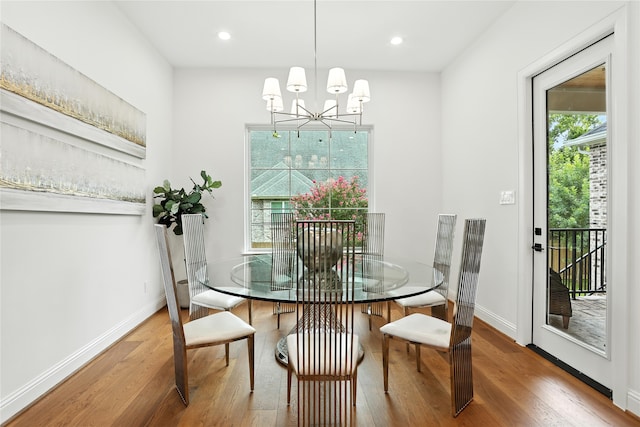 4951 Glenmeadow Dr, Houston, TX 77096 - dining room featuring wood finished floors, a chandelier, and recessed lighting