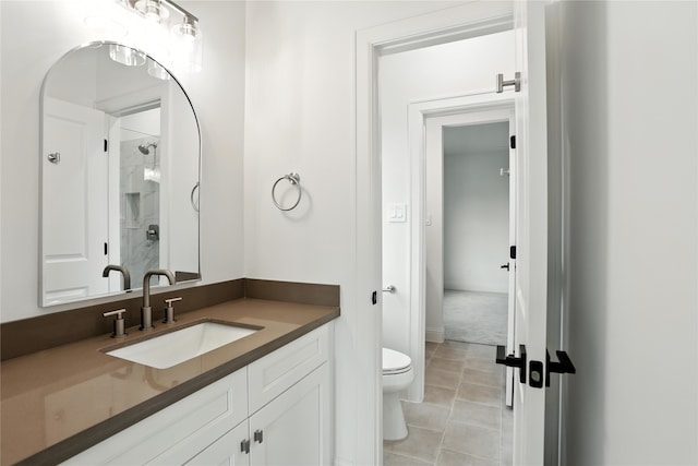 4951 Glenmeadow Dr, Houston, TX 77096 - bathroom featuring vanity, a shower, and tile patterned floors