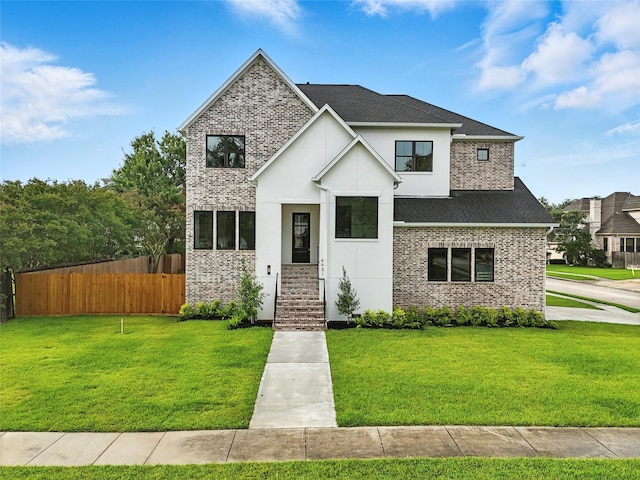 4951 Glenmeadow Dr, Houston, TX 77096 - view of front of house with roof with shingles, brick siding, and stucco siding