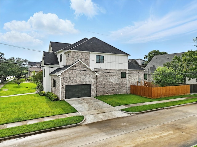 4951 Glenmeadow Dr, Houston, TX 77096 - view of front of property with brick siding, driveway, and an attached garage