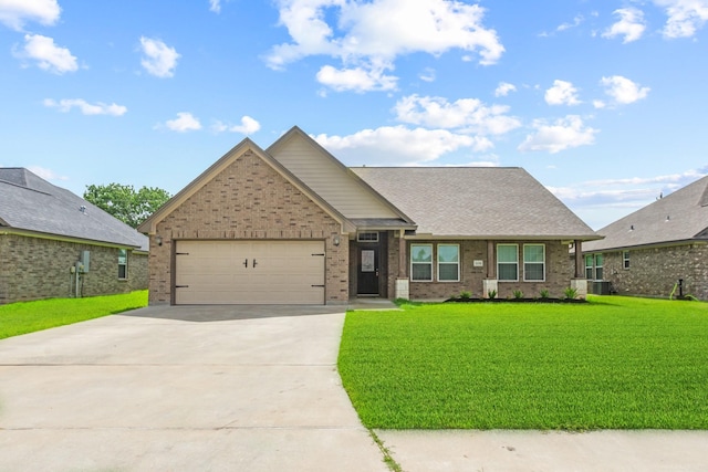 308 Yorktown Ave, Clute, TX 77531 - view of front of property featuring brick siding, concrete driveway, an attached garage, and a front lawn