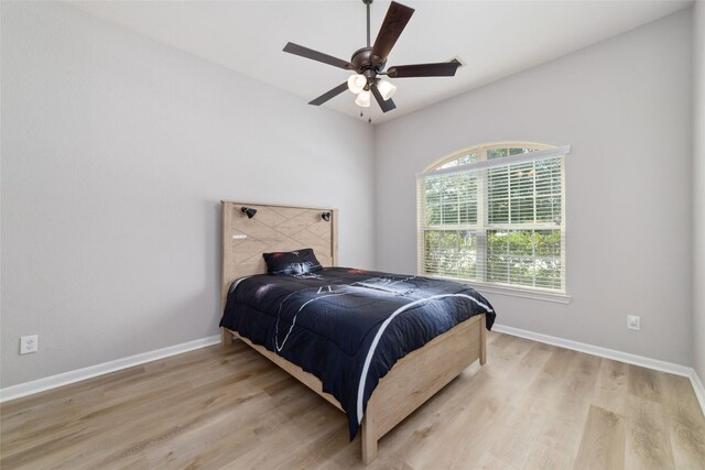 4610 Western Brook Dr, Spring, TX 77388 - bedroom with light wood-style floors and a ceiling fan