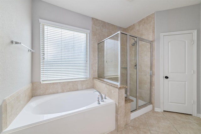 4610 Western Brook Dr, Spring, TX 77388 - full bath featuring a garden tub, a shower stall, tile patterned flooring, and healthy amount of natural light