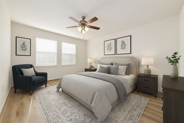 7726 Granite Terrace Ln, Houston, TX 77083 - bedroom with light wood-type flooring and a ceiling fan