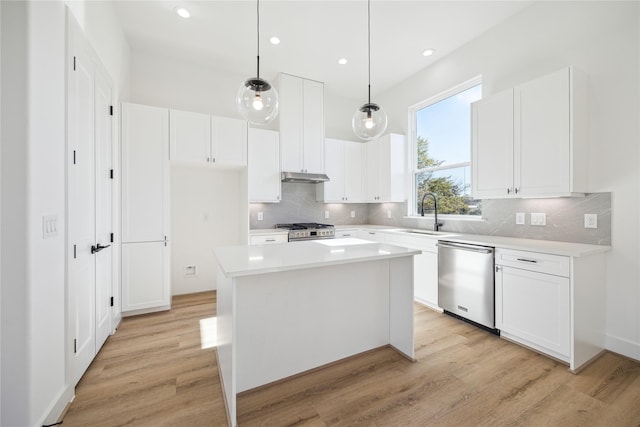 11109 Savannah Woods Ln, Houston, TX 77043 - kitchen with appliances with stainless steel finishes, white cabinets, and recessed lighting