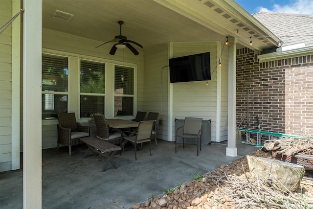 12118 Enclave Ct, Santa Fe, TX 77510 - view of patio / terrace featuring a ceiling fan and outdoor dining space