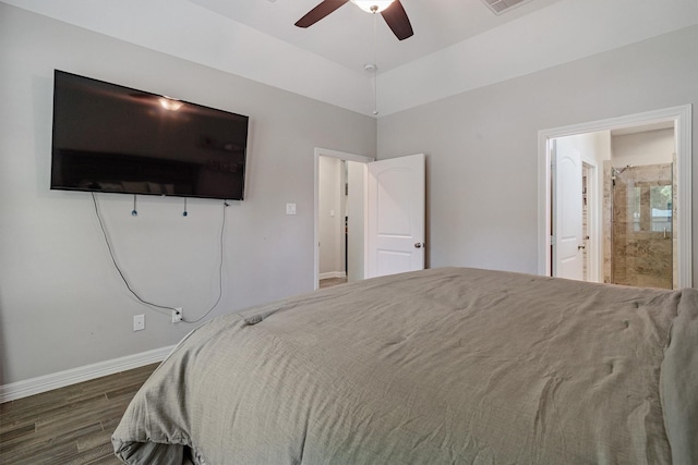 12118 Enclave Ct, Santa Fe, TX 77510 - bedroom with wood finished floors, connected bathroom, and a ceiling fan
