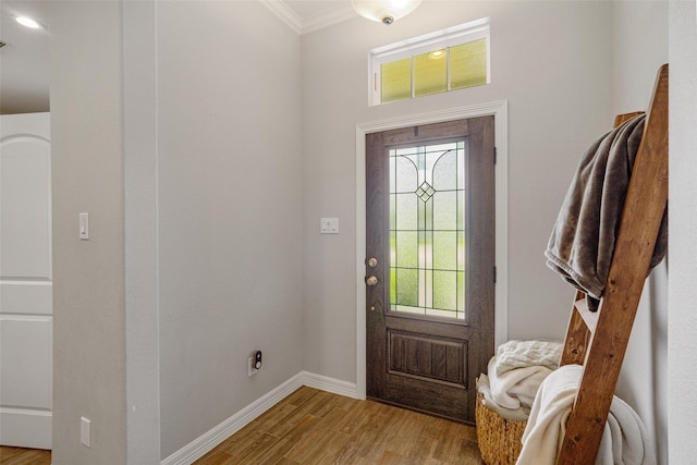 12118 Enclave Ct, Santa Fe, TX 77510 - foyer entrance featuring crown molding and light wood-style floors