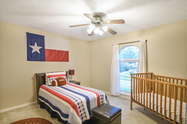 22419 Kent Falls Dr, Katy, TX 77450 - carpeted bedroom featuring ceiling fan and a textured ceiling