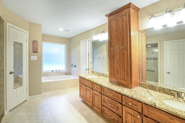 22419 Kent Falls Dr, Katy, TX 77450 - full bathroom featuring a bath, double vanity, tiled shower, and tile patterned flooring