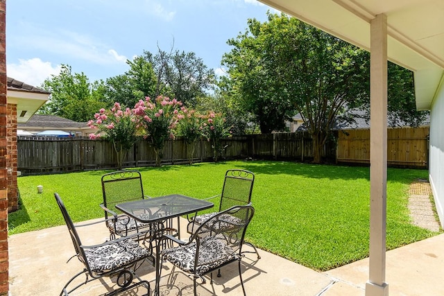 22419 Kent Falls Dr, Katy, TX 77450 - fenced backyard featuring a patio area and outdoor dining space