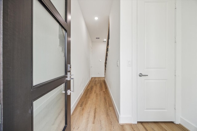 10927 Brookeshire Chase Ln, Houston, TX 77043 - hallway with light wood-type flooring and recessed lighting