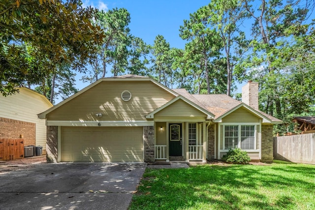 6 Fairmeade Bend Dr, The Woodlands, TX 77381 - view of front of home with driveway, a chimney, a garage, and a shingled roof
