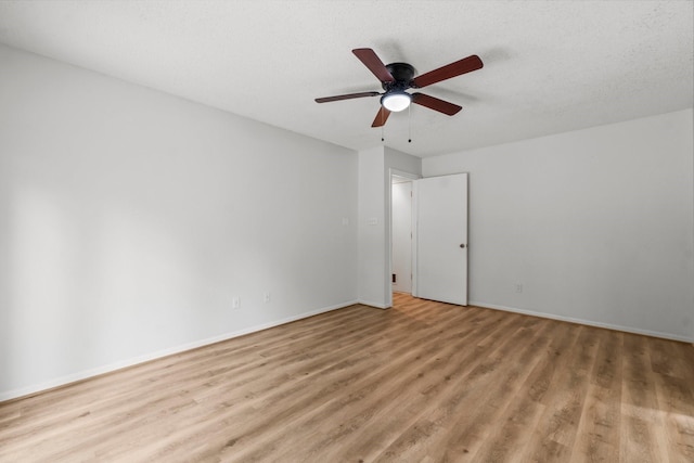 6 Fairmeade Bend Dr, The Woodlands, TX 77381 - spare room with light wood-style floors and ceiling fan