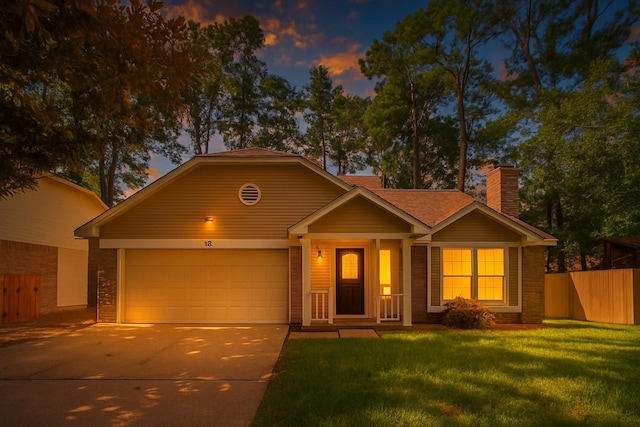 6 Fairmeade Bend Dr, The Woodlands, TX 77381 - view of front of home featuring driveway, a chimney, and a garage