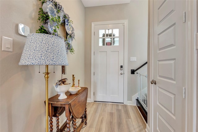 2507 Bay Breeze Dr, Kemah, TX 77565 - foyer entrance with light wood-type flooring and baseboards
