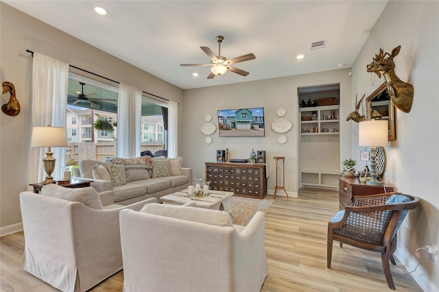 2507 Bay Breeze Dr, Kemah, TX 77565 - living room with ceiling fan, light wood-type flooring, and recessed lighting