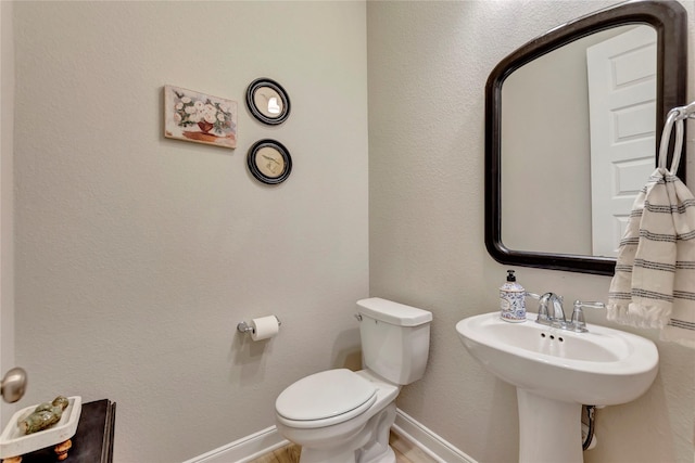 2507 Bay Breeze Dr, Kemah, TX 77565 - half bath with toilet and wood finished floors
