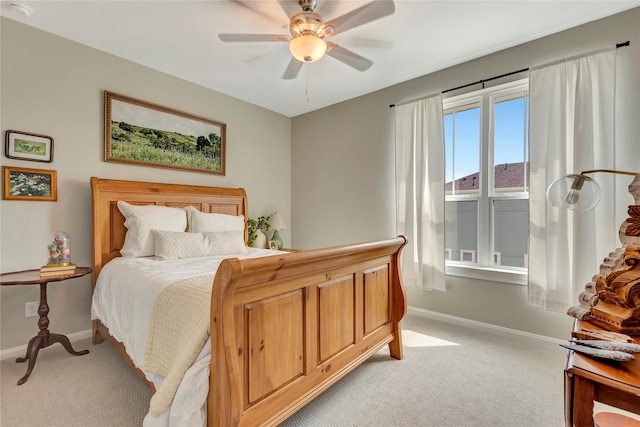 2507 Bay Breeze Dr, Kemah, TX 77565 - bedroom with light carpet and a ceiling fan