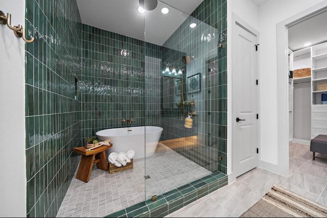 8707 Padua Ln, Houston, TX 77055 - full bath with walk in shower, a freestanding tub, and recessed lighting